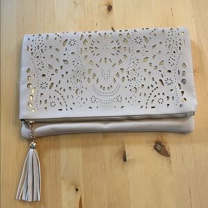 Chic Laser Cut Clutch with Tassel